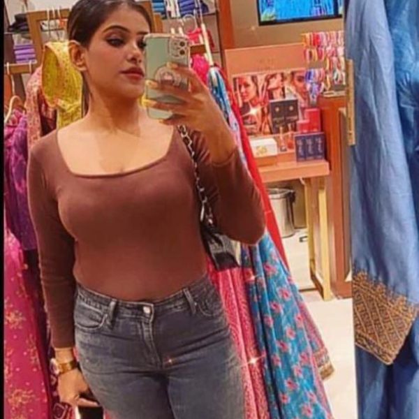 A refined call girl in Nawabganj sharing a candlelight dinner, symbolizing romantic companionship and personalized escort experiences